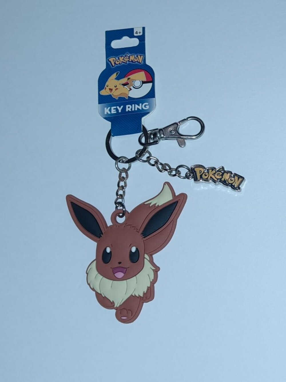 NWT Pokemon Eevee Flexible Rubber Keychain Metal Logo Charm